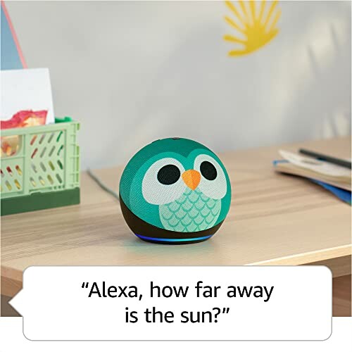 Echo Dot Kids Edition with owl design on desk