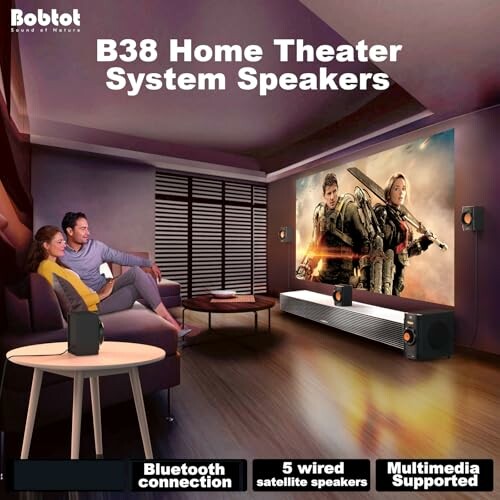 Couple watching movie with B38 home theater system speakers.