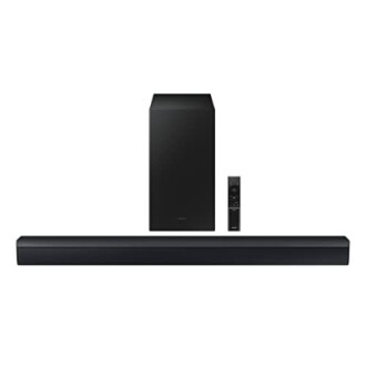 Black soundbar with subwoofer and remote control.