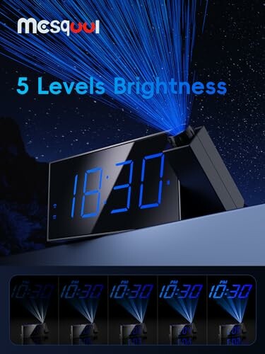 Digital alarm clock with blue LED display and projection capabilities.