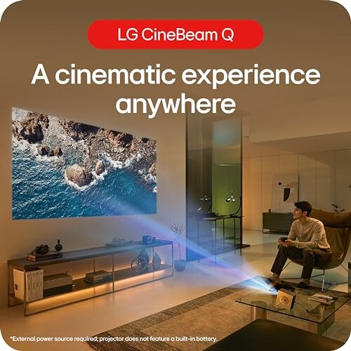 Man using LG CineBeam Q projector in a modern living room.