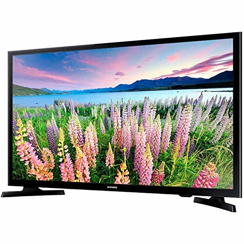 Samsung HD TV displaying a scenic landscape with flowers and mountains.