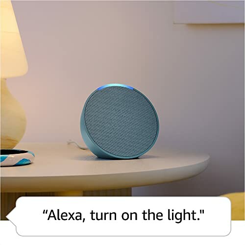 Smart speaker on a table with voice command text.