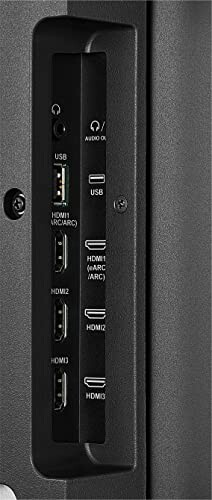 Close-up of TV ports including HDMI and USB.